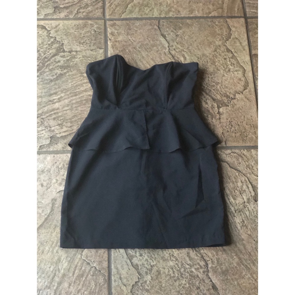 Strapless black peplum dress